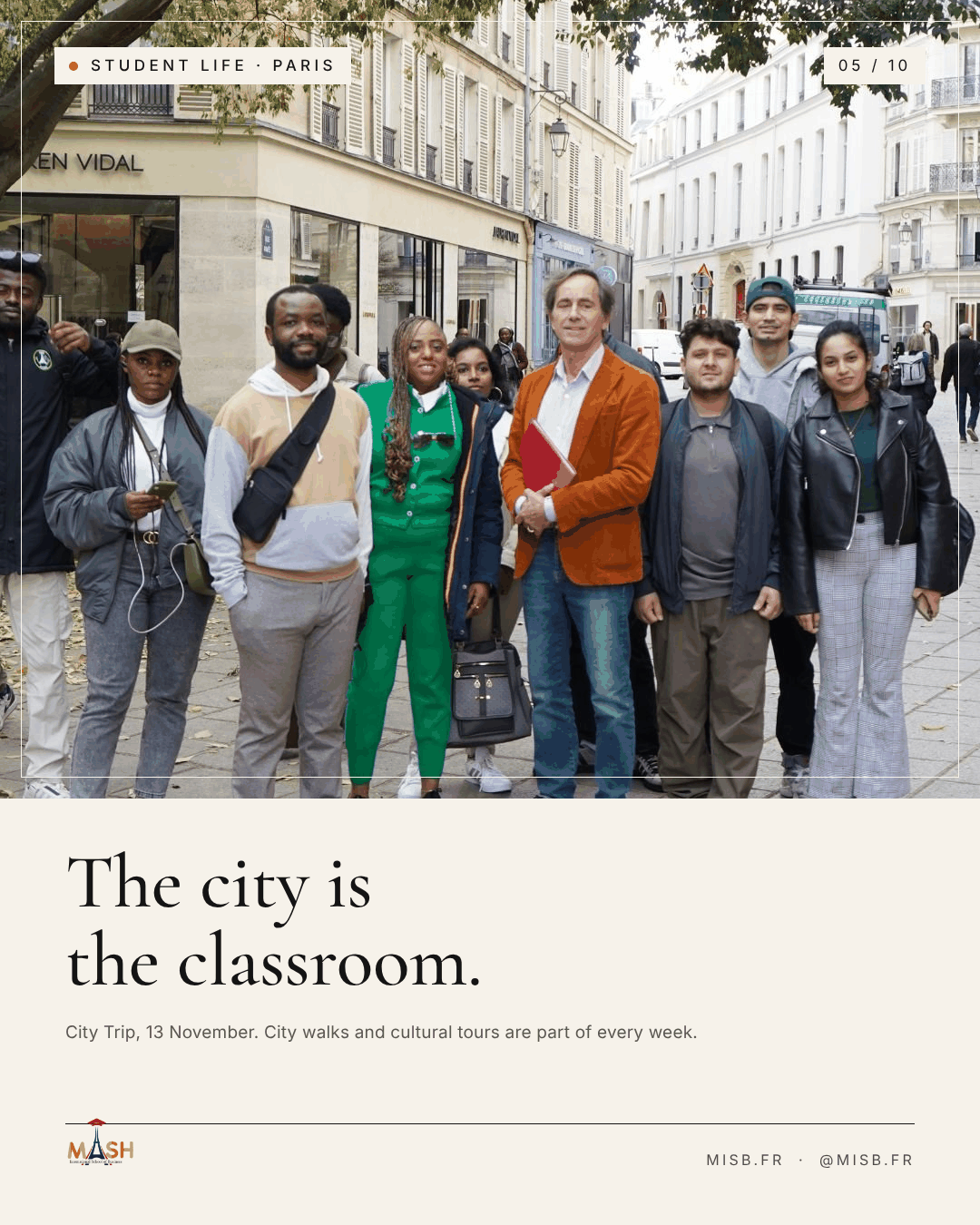 A group of students and a professor in an orange jacket standing together on a Paris street lined with pale stone buildings; headline "The city is the classroom."